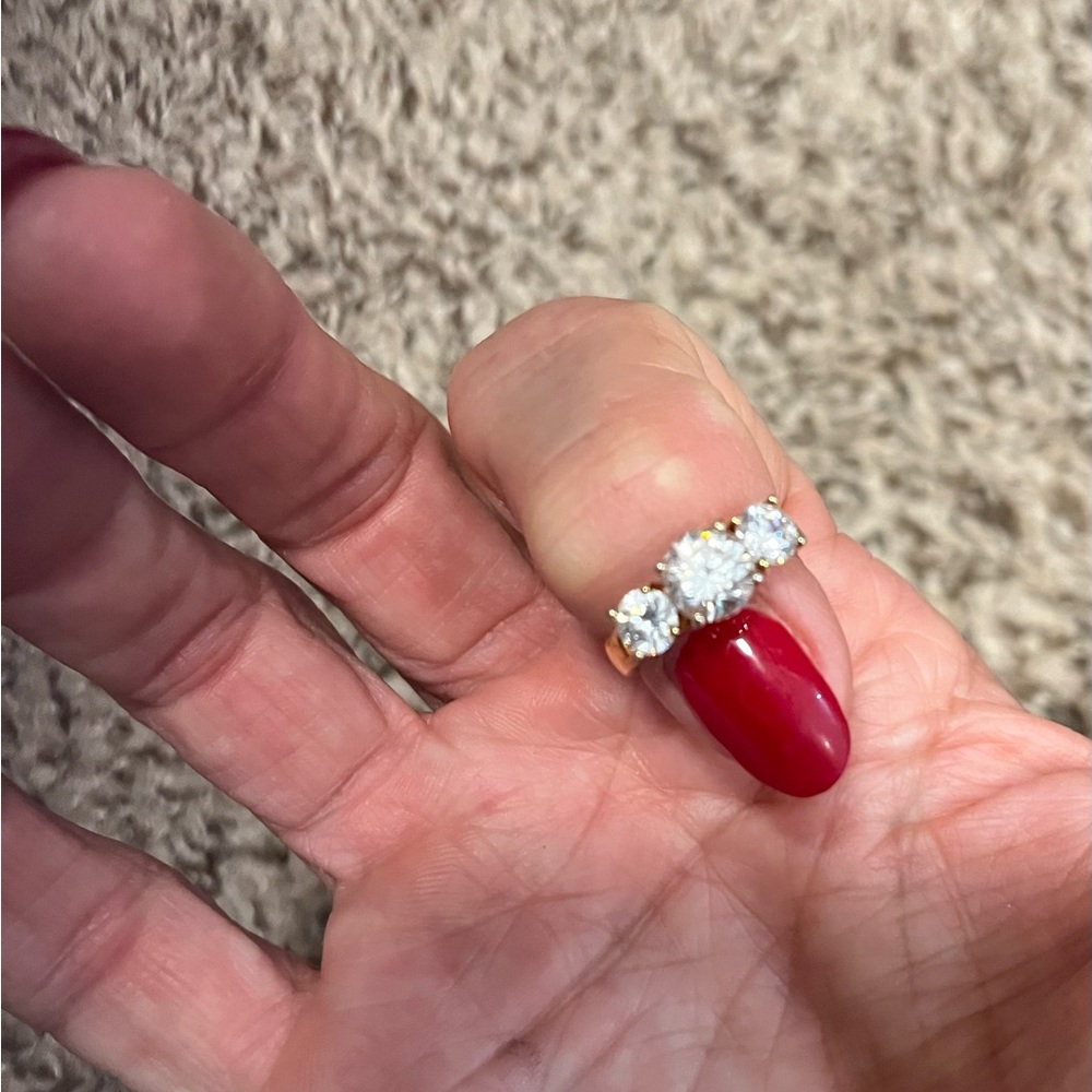 Gold plated ring with the zirconia diamonds